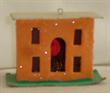 Cardboard house, vintage orange