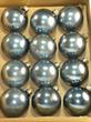 Vintage dark blue/grey Corning glass ornaments.